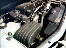 Modern air filters are cylindrical or rectangular like this one from a Ford Explorer.