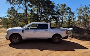 white 2023 ford maverick lariat tremor side view