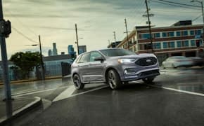 2024 Ford Edge turning on a curb