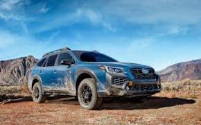 2024 Subaru Outback side and front view