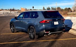 2024 Toyota Grand Highlander side and back view