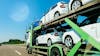 Truck transporting cars