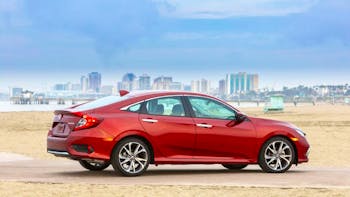 Honda Civic parked at the beach