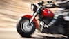 Abstract slow motion, biker riding motorbike