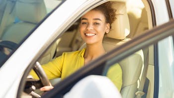 young woman learning to drive