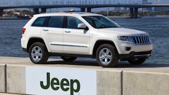 Jeep Grand Cherokee parked at the sea side
