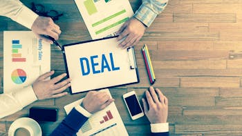 Business meeting sealing a deal