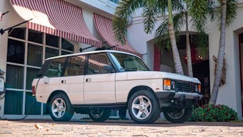 White Tesla-powered Range Rover