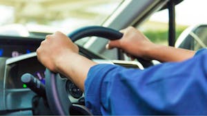Close Up of Driving a car