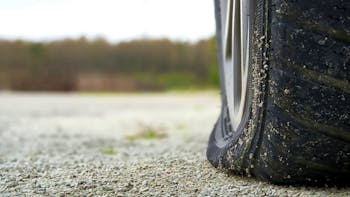Close-up of Flat rear tire on car