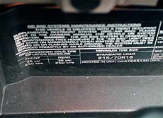 If the specs aren't on any door post, check inside the glove compartment (pictured), under the center console cover or in the owner's manual.